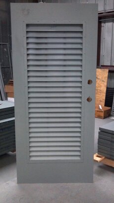 Louvered steel door